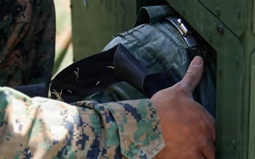 7th Communication Battalion Marines conduct strap exercise during Stormbreaker 26.2