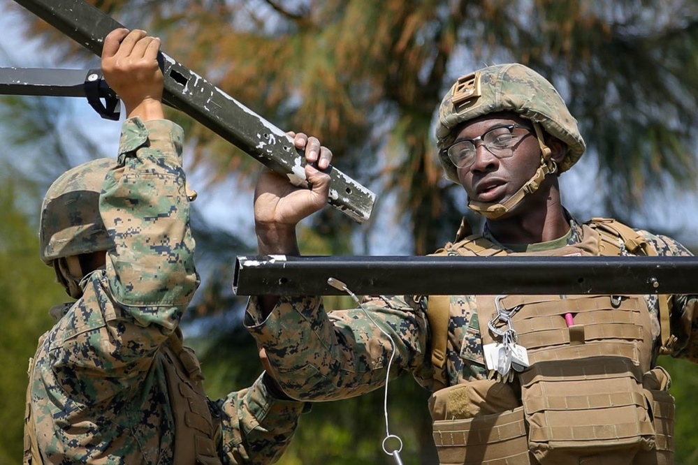 7th Communication Battalion Marines conduct strap exercise during Stormbreaker 26.2