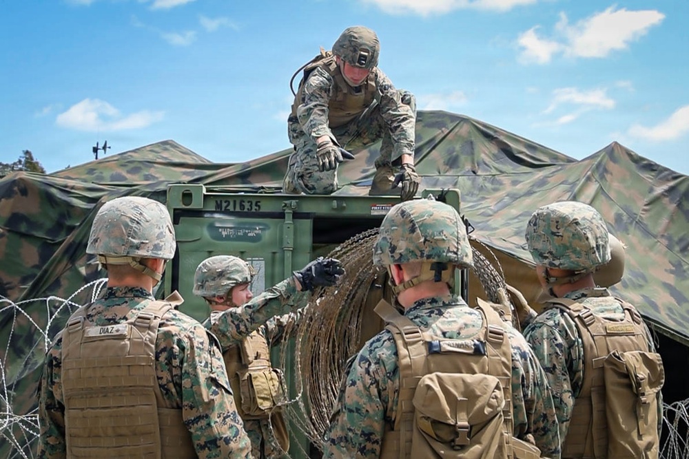 7th Communication Battalion Marines conduct strap exercise during Stormbreaker 26.2