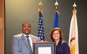 Kimberly G. Ploskonka, director of the Research Business Directorate at DEVCOM ARL, SES pinning and induction ceremony