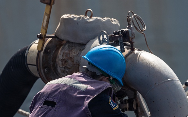 USS Bainbridge Conducts a Replenishment-at-Sea with USNS William McLean