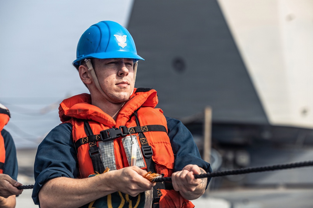 USS Bainbridge Conducts a Replenishment-at-Sea with USNS William McLean