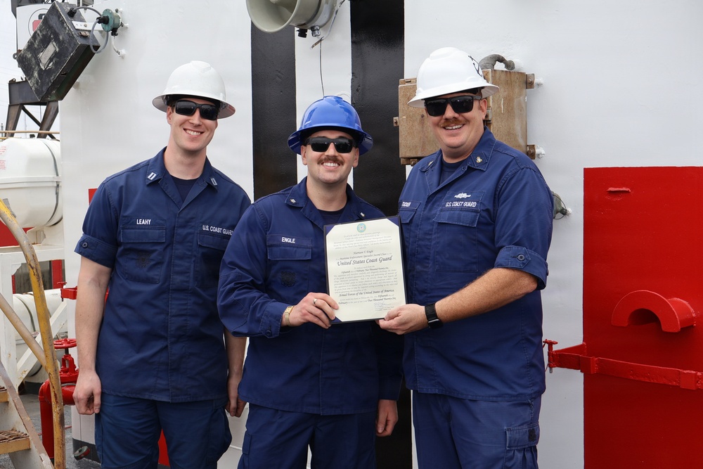 Atlantic Area commander meritoriously advances USCGC Reliance crew member