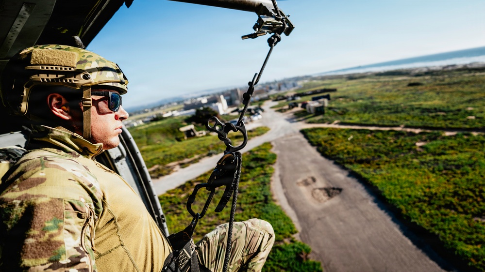 EOD Technicians Practice Daytime Rappelling Techniques