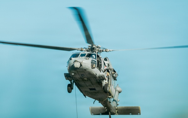 EOD Technicians Practice Daytime Rappelling Techniques