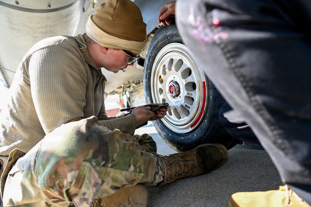 169th Aircraft Maintenance Squadron crew chiefs work on the flight line