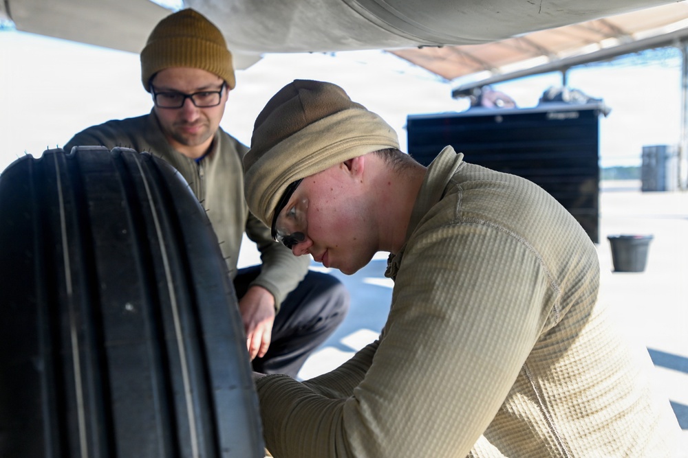 169th Aircraft Maintenance Squadron crew chiefs work on the flight line