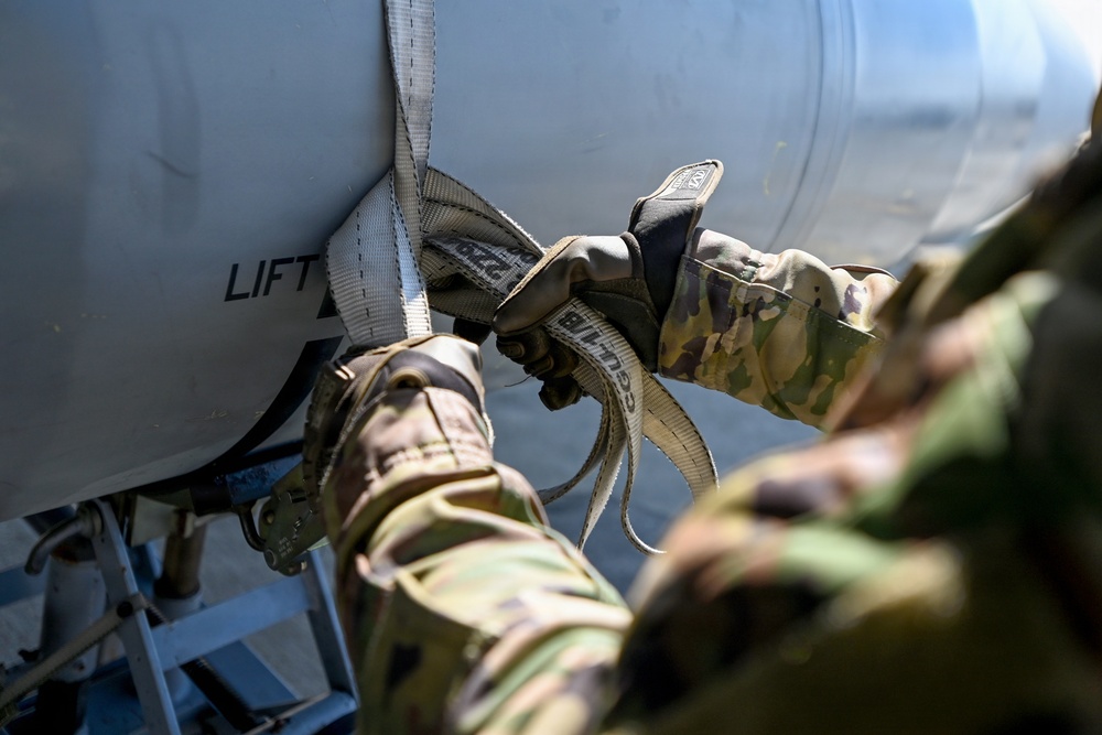 169th Aircraft Maintenance Squadron crew chiefs work on the flight line