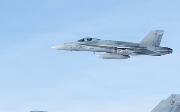 CORE26 | Air-to-air U.S. Marine Refuel Finnish F/A-18 Hornets over Arctic Circle