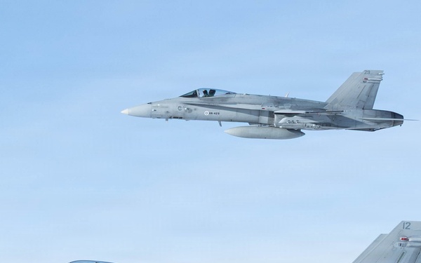 CORE26 | Air-to-air U.S. Marine Refuel Finnish F/A-18 Hornets over Arctic Circle