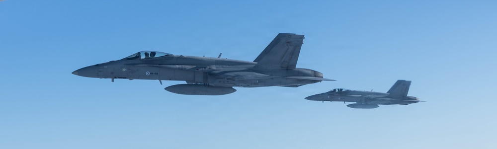 CORE26 | Air-to-air U.S. Marine Refuel Finnish F/A-18 Hornets over Arctic Circle