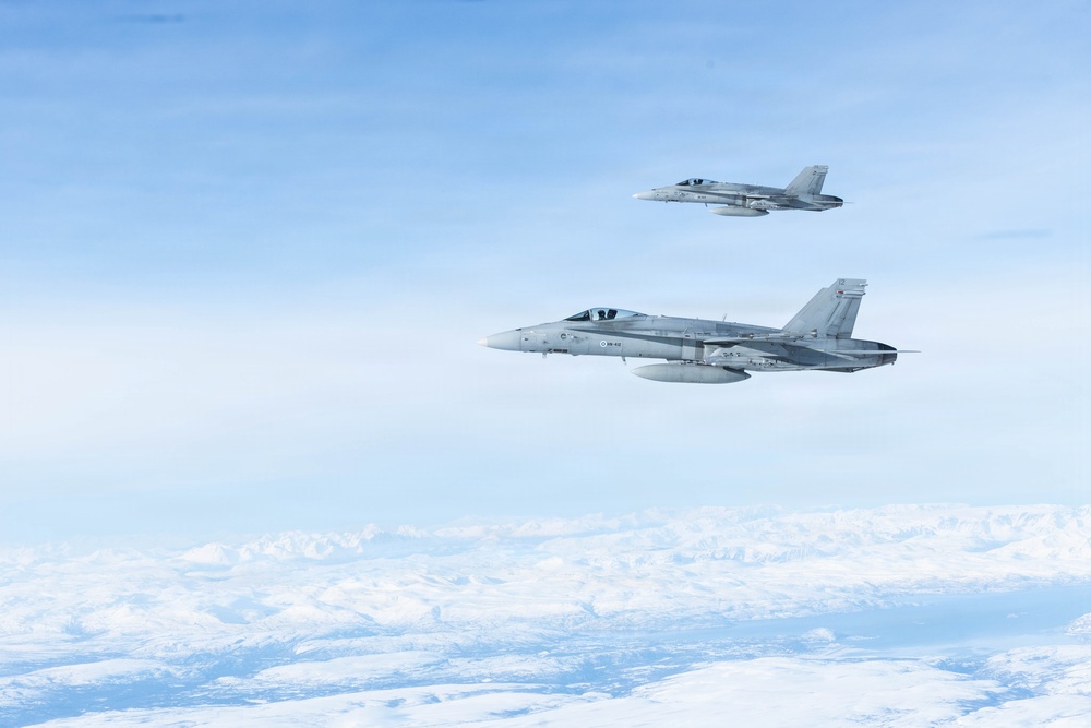 CORE26 | Air-to-air U.S. Marine Refuel Finnish F/A-18 Hornets over Arctic Circle