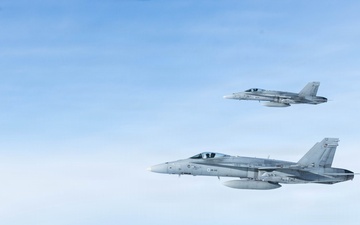 CORE26 | Air-to-air U.S. Marine Refuel Finnish F/A-18 Hornets over Arctic Circle