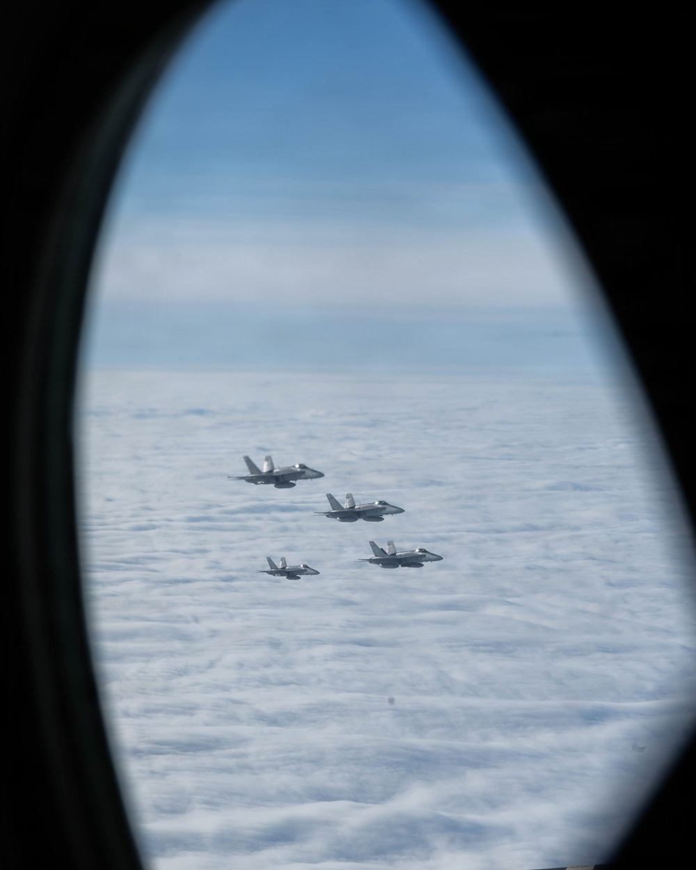 CORE26 | Air-to-air U.S. Marine Refuel Finnish F/A-18 Hornets over Arctic Circle