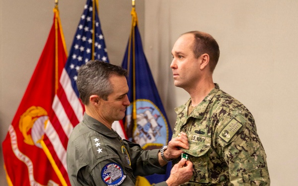 VADM Perry awards CDR Robinson for rescue