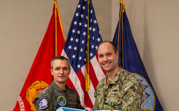 VADM Perry awards CDR Robinson for rescue