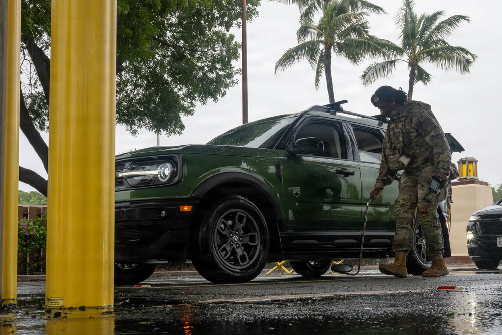 647 SFS defenders stand post during kona storm