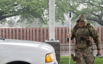 647 SFS defenders stand post during kona storm