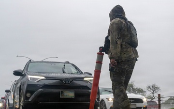 647 SFS defenders stand post during kona storm