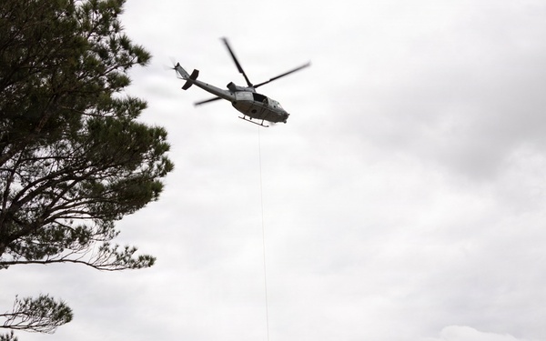 U.S. Marines with 3rd Reconnaissance Battalion conduct a covert landing in a simulated hostile environment