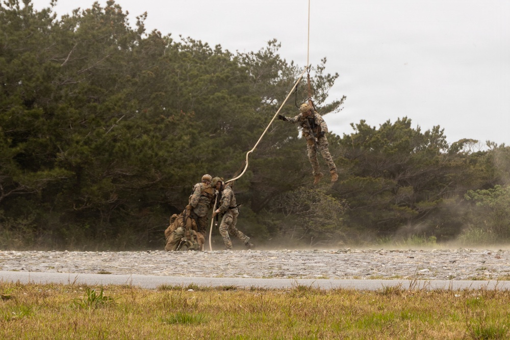 U.S. Marines with 3rd Reconnaissance Battalion conduct a covert landing in a simulated hostile environment