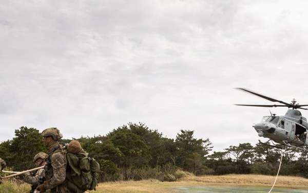 U.S. Marines with 3rd Reconnaissance Battalion conduct a covert landing in a simulated hostile environment