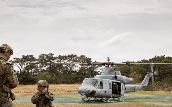 U.S. Marines with 3rd Reconnaissance Battalion conduct a covert landing in a simulated hostile environment