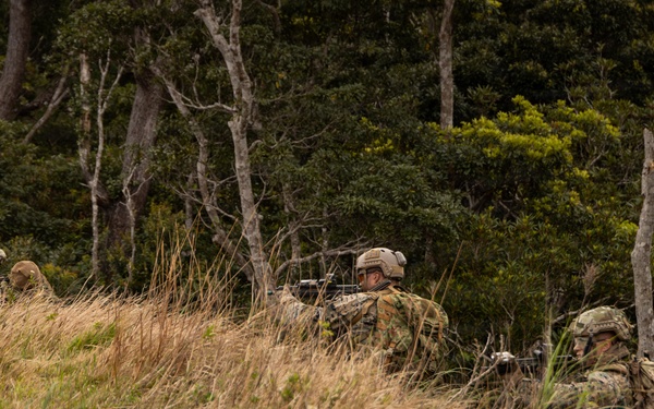 U.S. Marines with 3rd Reconnaissance Battalion conduct a covert landing in a simulated hostile environment