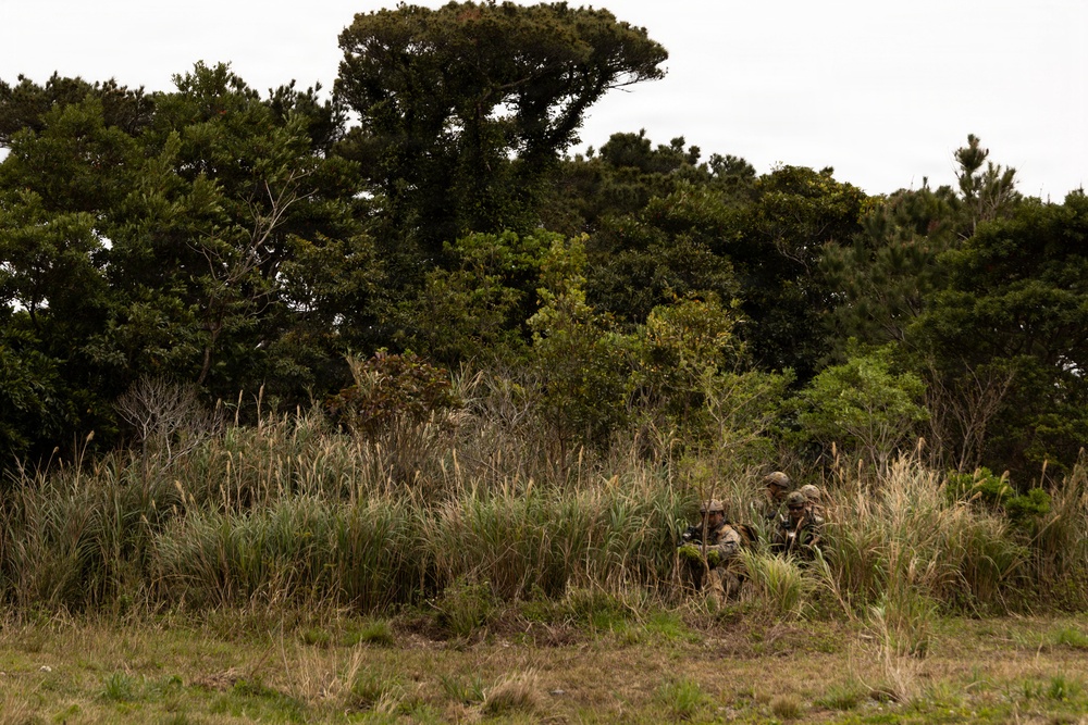 U.S. Marines with 3rd Reconnaissance Battalion conduct a covert landing in a simulated hostile environment