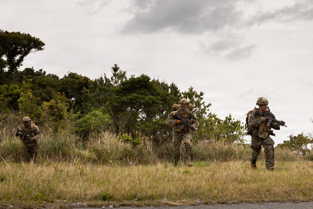 U.S. Marines with 3rd Reconnaissance Battalion conduct a covert landing in a simulated hostile environment