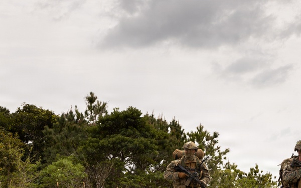 U.S. Marines with 3rd Reconnaissance Battalion conduct a covert landing in a simulated hostile environment