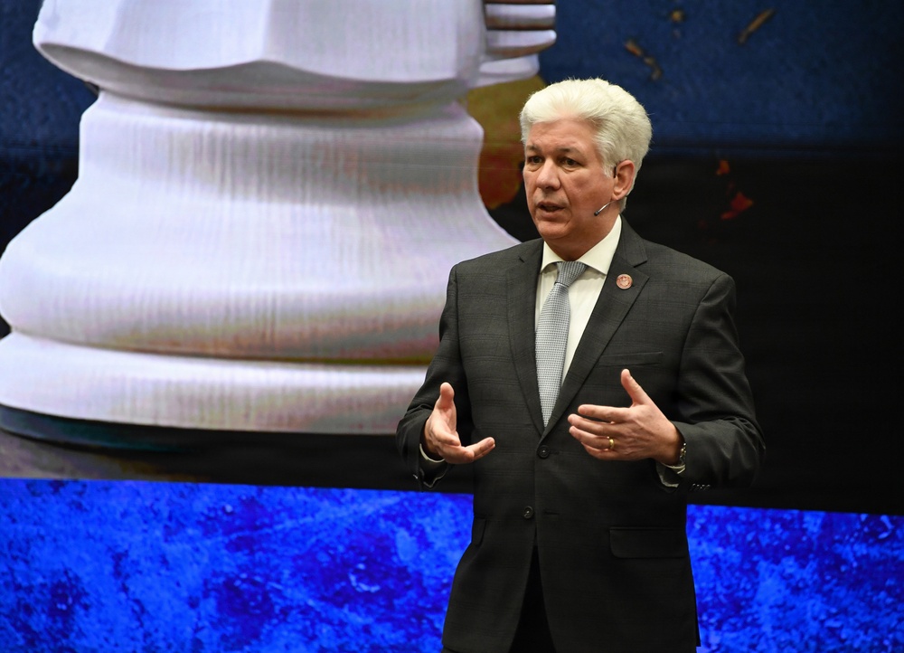 Retired Maj. Gen. Barre Seguin engages with participants