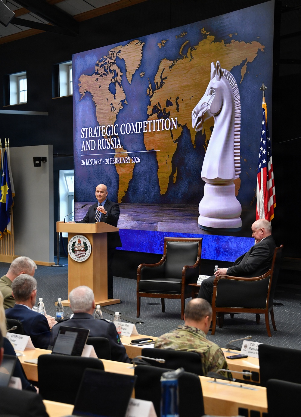 Retired Gen. Christopher Cavoli speaks to participants during Strategic Competition and Russia