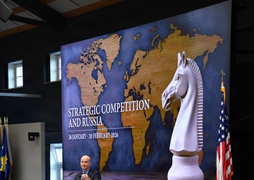 Retired Gen. Christopher Cavoli speaks to participants during Strategic Competition and Russia