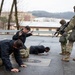 MP Soldiers give commands to simulated detainees