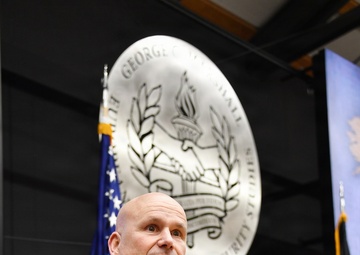 Retired Gen. Christopher Cavoli engages with participants during Strategic Competition and Russia