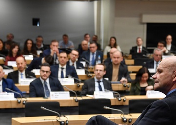 Retired Gen. Christopher Cavoli engages with participants during the Strategic Competition in Russia course