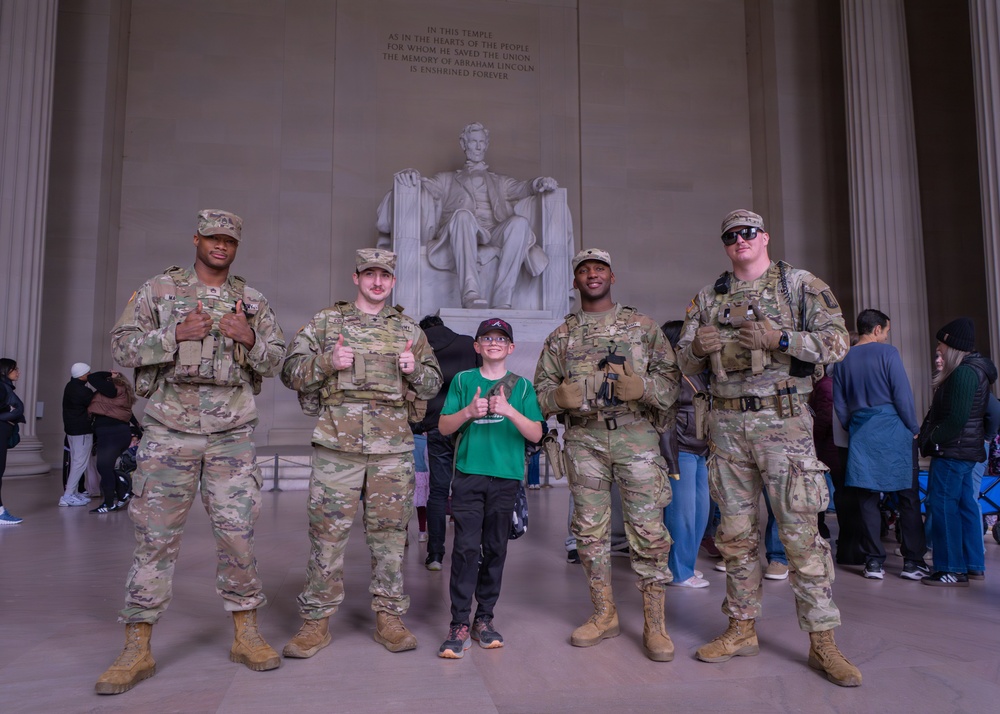 Joint Task Force Magnolia Soldiers patrol at the Lincoln Memorial