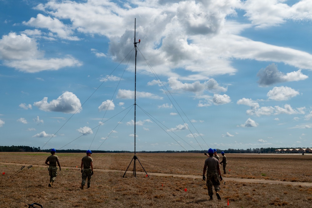 245th Combat Airfield Operations Squadron maintainers and controllers train in a mock deployment environment