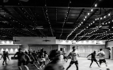 Team Hickam's 647th Security Forces Squadron and 15th Operational Support Team conduct group physical training