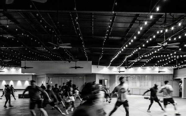 Team Hickam's 647th Security Forces Squadron and 15th Operations Support Team conduct group physical training