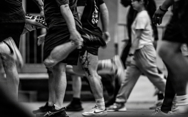 Team Hickam's 647th Security Forces Squadron and 15th Operations Support Team conduct group physical training