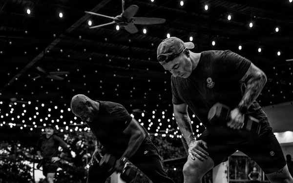 Team Hickam's 647th Security Forces Squadron and 15th Operations Support Team conduct group physical training