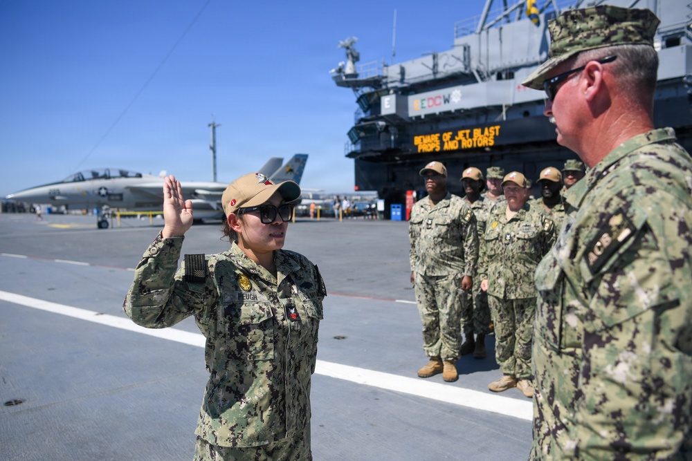 Master-at-Arms 1st Class Jovelyn Peugh reenlists aboard historic USS Midway Museum