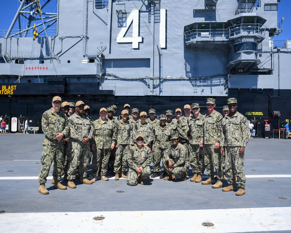 Master-at-Arms 1st Class Jovelyn Peugh reenlists aboard historic USS Midway Museum