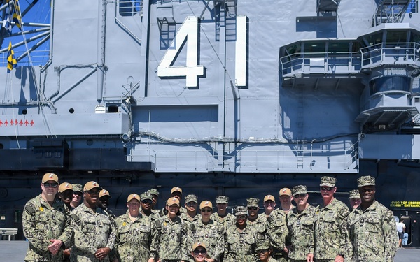 Master-at-Arms 1st Class Jovelyn Peugh reenlists aboard historic USS Midway Museum