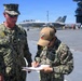 Master-at-Arms 1st Class Jovelyn Peugh reenlists aboard historic USS Midway Museum