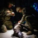 Military Police Canine Handlers Practice Lifesaving Medical Skills on Simulated Canine Casualty