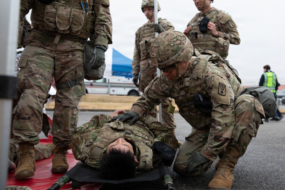 Military Intelligence Soldiers Partner with Garrison Firefighters During Simulated Mass Casualty Exercise