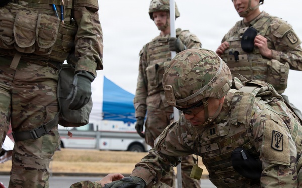 Military Intelligence Soldiers Partner with Garrison Firefighters During Simulated Mass Casualty Exercise